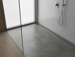 Évacuation douche italienne : normes, pente et prix 2026