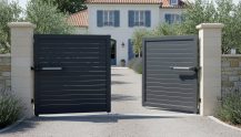 Motorisation portail 2 battants : prix, types et pose 2026 (+ devis)
