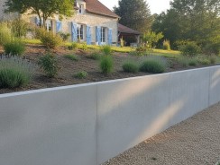 Mur de soutènement : réglementation 2026 (hauteur, permis, mitoyenneté)